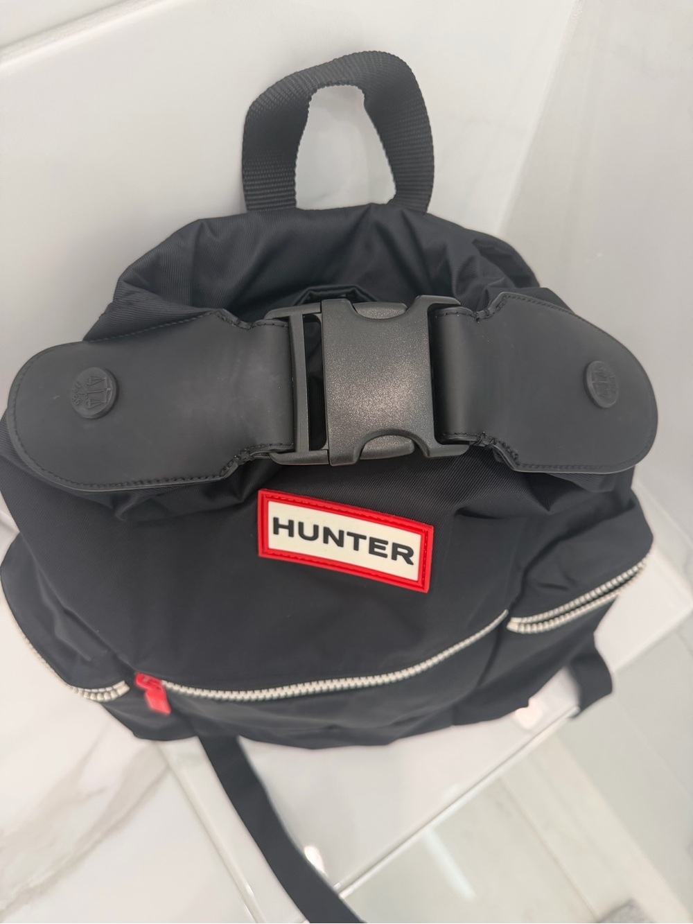 Hunter Black Backpack with Red Trim and White Zippers - Picture 2 of 3